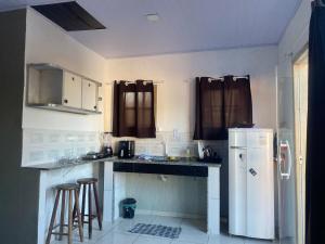 Kitnet em casa à beira-mar