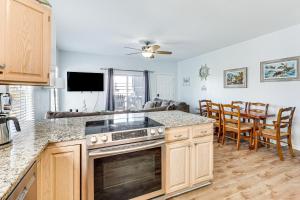 Carolina Beach Condo with Deck Steps to Shore!