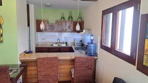 Poolside Paradise Condo Awaits