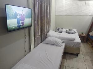 Mi Hábitat Dormitorios con Sala Cocina Comedor y Quincho