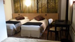 Hotels Le Merle Blanc Hotel Logis : photos des chambres