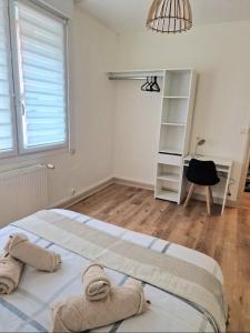 Appartements Caprices des vagues - A 300 m de la plage et a 4 kilometres de Nausicaa, Place de parking privee, Eau douce, Netflix, Primes Video, Wifi haut debit : photos des chambres