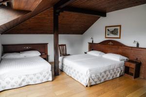 Quadruple Room room in Hôtel de Gruyères