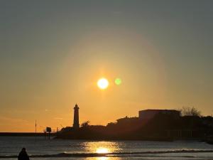 Appartements Maisonnette au pied du marche et 300 m de la plage : photos des chambres