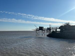 Appartements Maisonnette au pied du marche et 300 m de la plage : photos des chambres