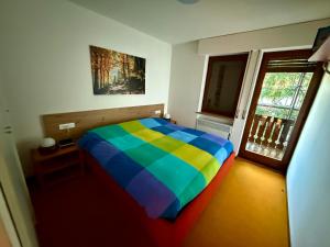 Appartamento per Famiglie in Centro ad Asiago con Posto Auto e Ampio Giardino