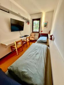 Appartamento per Famiglie in Centro ad Asiago con Posto Auto e Ampio Giardino