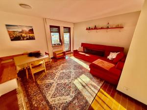 Appartamento per Famiglie in Centro ad Asiago con Posto Auto e Ampio Giardino