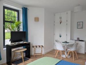 Appartements Les Jolis Nids - Appartement Perroquet : photos des chambres