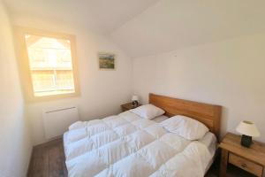 Chalets Votre Havre de Paix en Montagne - chalet 6 personnes avec piscine et sauna : photos des chambres