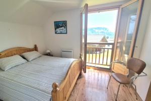 Chalets Votre Havre de Paix en Montagne - chalet 6 personnes avec piscine et sauna : photos des chambres