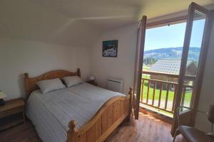 Chalets Votre Havre de Paix en Montagne - chalet 6 personnes avec piscine et sauna : photos des chambres