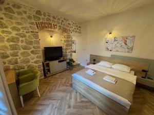 Double Studio with Garden room in Apartments Marilu