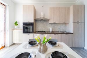 Elegante Appartamento con Terrazzo - Parcheggio Gratuito Privato & Wifi