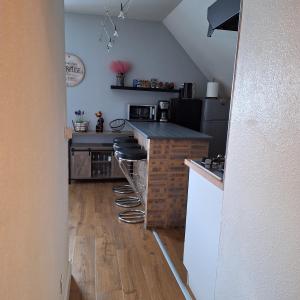 Appartements Sous un charmant toit : photos des chambres