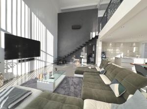 Appartements Loft Atypique Beaucaire : photos des chambres