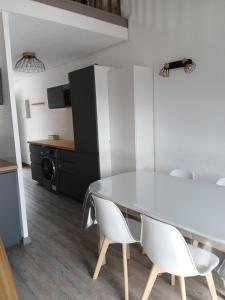 Appartements Appartement chaleureux. : photos des chambres