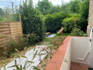Appartements Le Cocon - proche gare avec jardinet - 2 adultes et 1 bebe : photos des chambres