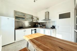 Maisons de vacances Spacieuse maison renovee avec gout - Tout a pied : photos des chambres