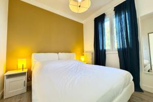 Maisons de vacances Spacieuse maison renovee avec gout - Tout a pied : photos des chambres