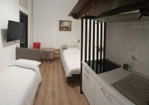 Camera Doppia con Letti Singoli con Bagno Privato