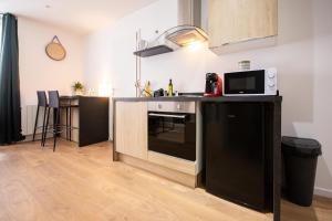 Appartements L-Indigo, plein centre, WIFI-Netflix : photos des chambres
