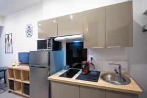 Appartements Le Lionceau, Proche ville, Fibre&Netflix, Parking : photos des chambres