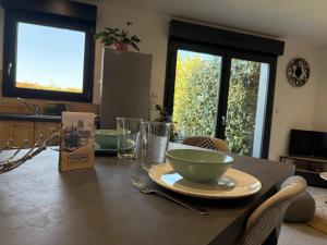 Appartements La Maison d-a Cote : photos des chambres