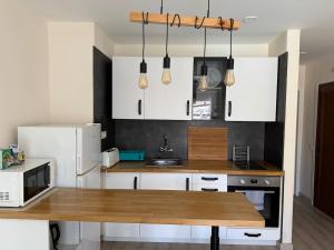 Centrally located M, bright and sunny apartment with terrace and pool views