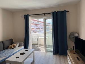 Centrally located bright and sunny apartment with terrace and pool views