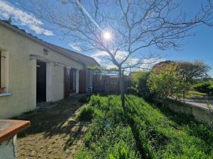 Maisons de vacances Maison avec jardin et garage : photos des chambres