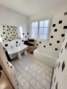 Appartements Grand pavillon avec jardin : photos des chambres