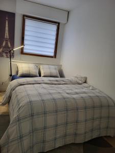 Appartements Confort et parking a 10 min de Paris : photos des chambres