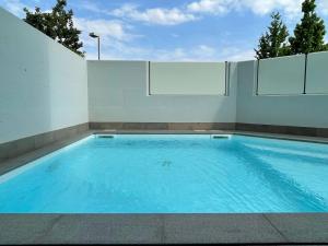 Appartamento in città con Giardino e Piscina privati