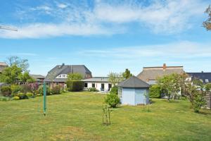 4 - Sterne Ferienhaus Am Brink mit Gartenter und Meerblick