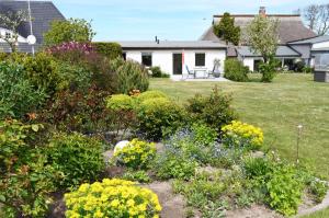 4 - Sterne Ferienhaus Am Brink mit Gartenter und Meerblick