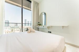 Community Views 1BR Next to Mall and Park, Binghatti Amber, Jumeirah Village Circle by Deluxe Holiday Homes