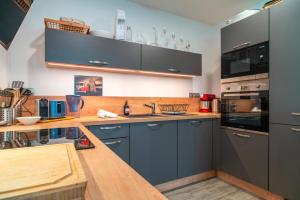 Maisons de vacances Ti Marsouin - Jolie maison avec exterieur : photos des chambres