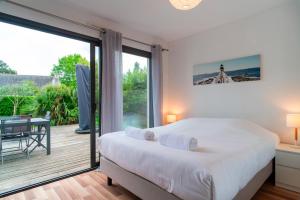 Maisons de vacances Ti Marsouin - Jolie maison avec exterieur : photos des chambres