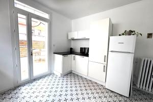 Appartements La Terrasse - Belle Terrasse - Wifi : photos des chambres