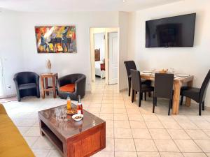 Appartements T3 en 3 etoiles de plain-pied, climatise, terrasse, jardinet et parking, tres calme : photos des chambres