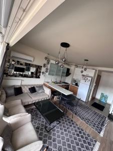 apartment tow bed room and living room with pool and gym