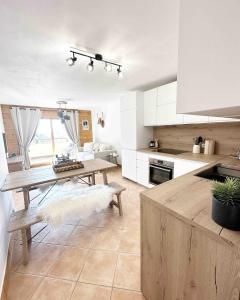 Appartements L-Ourson aux pieds des pistes & piscine chauffee : photos des chambres