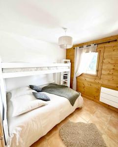 Appartements L-Ourson aux pieds des pistes & piscine chauffee : photos des chambres