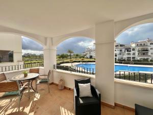 Charming apartment with a pool and golf view