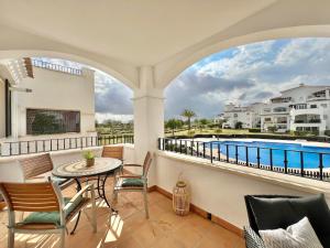 Charming apartment with a pool and golf view