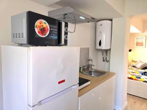 Begona White Pearl City Center Studio Nogalera by NAMASTE ELITE