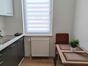 Gemütliches Appartement 1 - mit Küche und Bad zur Eigennutzung -Schuster Homes-