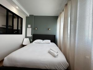 Appartements La Suite Faience, chic et calme : photos des chambres