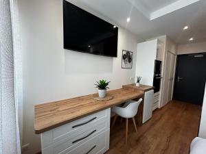 Appartements La Suite Faience, chic et calme : photos des chambres